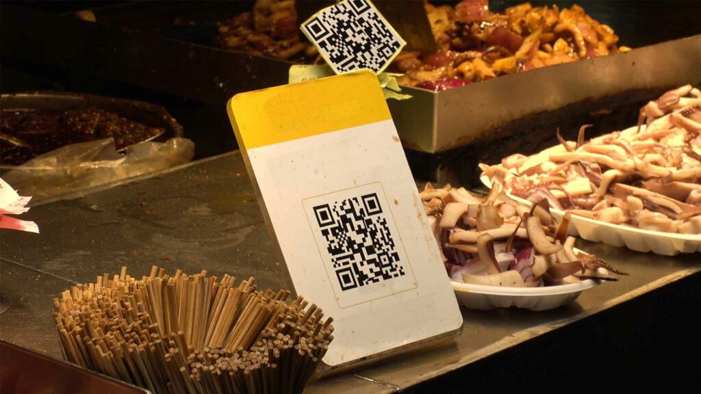 Barcode use case in a food court. QR code next to a product. 